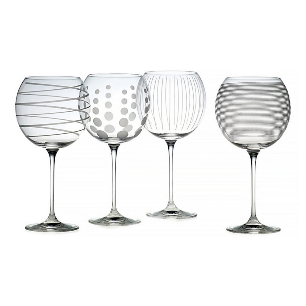 Set of 4 Mikasa wine glasses. Never used. Still in original box.